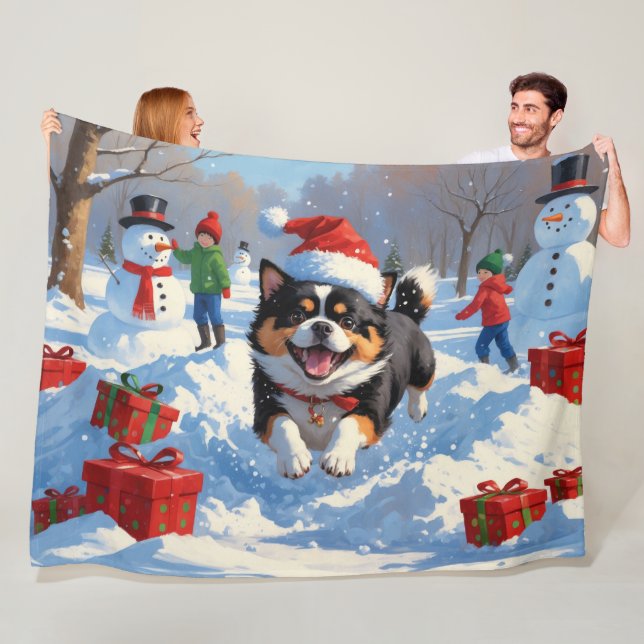 Japanese Chin Running in Snow with Christmas Hat Fleece Blanket (In Situ)