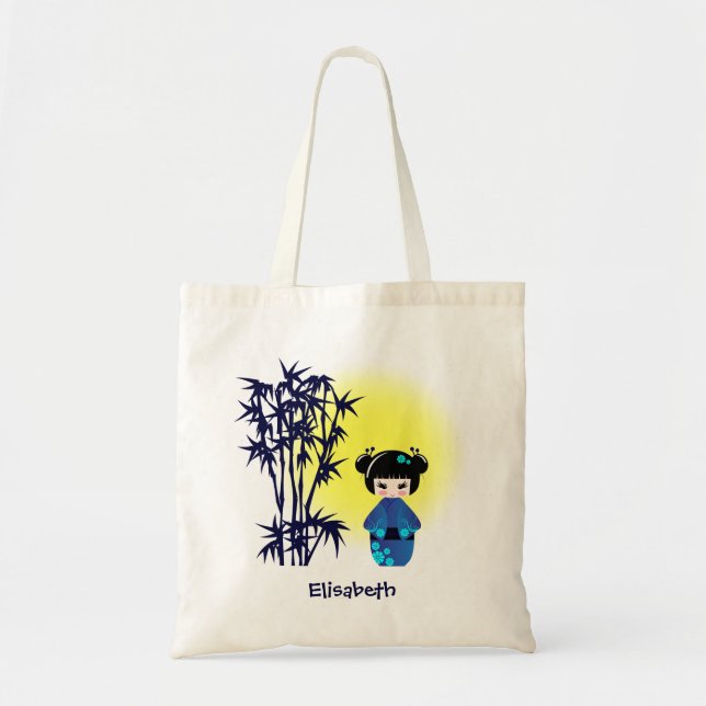 Japanese kokeshi doll at bamboo during sunrise tote bag (Front)