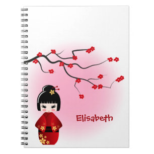 Japanese kokeshi doll at sakura blossoms notebook