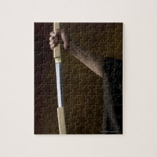 Japanese man holding sword 2 jigsaw puzzle