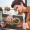 Jazzman Playing Gold Saxophone Photo