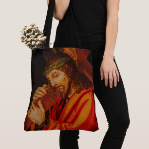 Jesus carrying the cross tote bag