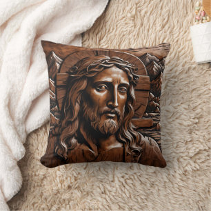 Jesus Carved in Wood Surrounded by Mountains Cushion