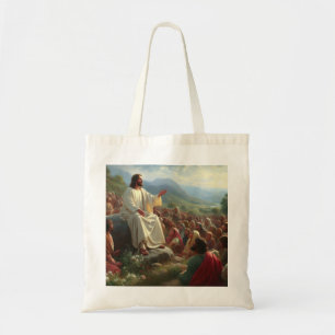Jesus Christ sits preaching to the masses Tote Bag
