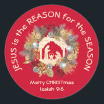 JESUS IS THE REASON Red Christmas Classic Round Sticker<br><div class="desc">Festive red JESUS IS THE REASON Christian Christmas sticker, showing a nativity scene inside a festive Christmas wreath. The inspirational quote reads JESUS IS THE REASON FOR THE SEASON in curved text, and underneath there is a placeholder greeting, MERRY CHRISTMAS and ISAIAH 9:6. ALL TEXT IS CUSTOMIZABLE, so you can...</div>