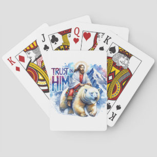 Jesus on a polar bear in mountains playing cards