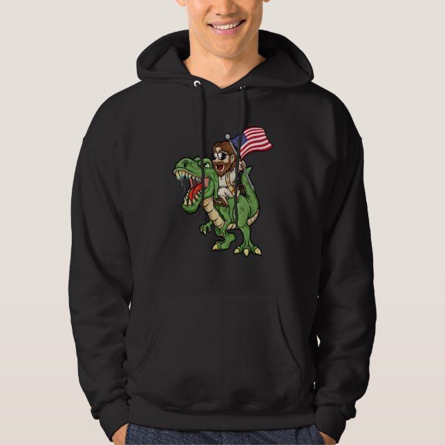 Jesus Riding A Tyrannosaurus Rex Dinosaur USA Flag Hoodie (Front)