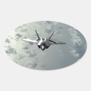 Jet Fighter Over Seas Oval Sticker