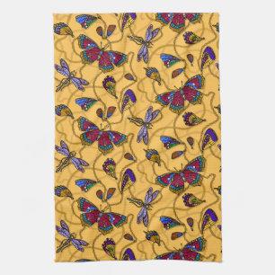 Jewellery butterflies and dragonflies on yellow tea towel