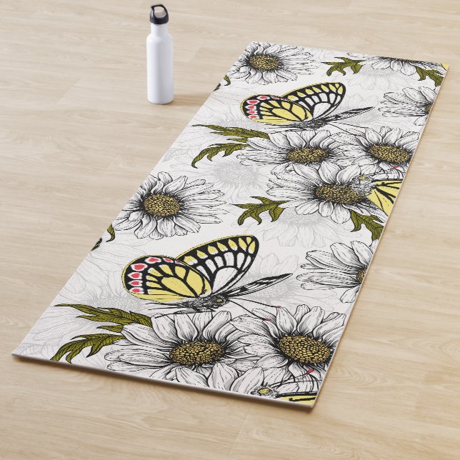 Jezebel butterflies and daisy flowers on white yoga mat (In Situ)