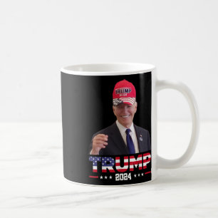 Joe Biden Wearing A Trump Hat 1  Coffee Mug