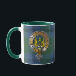 Johnstone Tartan & Badge Mug<br><div class="desc">Perfect for the games,  or gift. Use the EDIT DESIGN button and TRANSFER THIS DESIGN to any one of more than 1000 different products. Customise with photo and add text to create a unique gift sure to be a hit at the family reunion or Highland Games.</div>