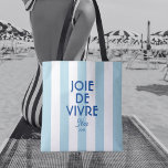 Joie De Vivre Nice Blue Cabana Stripe French Tote Bag<br><div class="desc">Carry a touch of French elegance wherever you go with our 'Joie De Vivre' Nice Blue Cabana Stripe French Tote Bag. Featuring a chic blue cabana stripe design, this versatile tote is perfect for everyday use, from beach trips to casual shopping outings. Personalise it with your custom year and destination...</div>