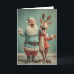 Jolly Santa and Rudolph Cheer Holiday Card<br><div class="desc">A fun and festive scene of Santa and his reindeer sharing a big laugh,  bursting with Christmas joy and vintage charm. Santa’s bright blue suit and Rudolph’s red nose bring playful holiday energy to life. Perfect for cheerful cards,  festive prints,  and gifts that spread smiles and Christmas spirit everywhere.</div>