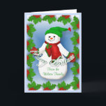 Jolly Snowman Christmas Card<br><div class="desc">Jolly frosty snowman with red scarf and mittens and green hat will bring a smile during the holidays. The holly border and blue background add to merry Christmas cheer of this unique greeting card. Add your family name to front of card and verse inside may be changed in the template...</div>