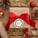 Joy Family Name Christmas Wreath Classic Round Sticker<br><div class="desc">Elegant Christmas greenery wreath personalised name stickers. Design features beautiful wreath of greenery,  pine cone and red holly berries. Perfect addition to your gift wrapping accessories this holiday season. Easy to personalise all text. Happy Holidays!</div>