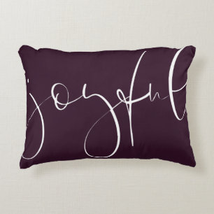 Joyful script plum holiday decorative cushion