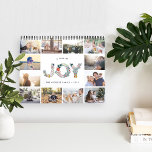 Joyful Type | 2019 Photo Calendar<br><div class="desc">Share a favourite memory on each page of this 2019 photo calendar. Cover features a thumbnail version of each photo with "a year of joy" in the centre in festive letters formed from holiday botanicals. Personalise the cover with your name(s) or family name and the year.</div>