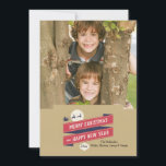 Joyous Holiday Photo Card<br><div class="desc">A tan background holds red ribbons with the message "Merry Christmas and Happy New Year". Santa and his sleigh is silhouetted in the background and a Christmas ornament holds the year. The card is easy to customise with your wording, font, font colour, paper shape options and choice of six paper...</div>