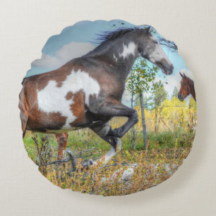Jumping Pinto Paint Stallion on a Horse Ranch Round Cushion