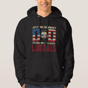 Just An Ordinary dad trying not to raise liberals Hoodie