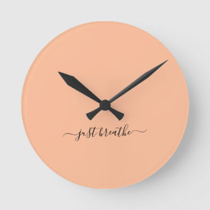 Just breathe orange elegant script yoga round clock
