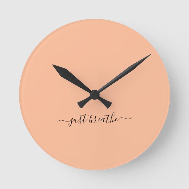 Just breathe orange elegant script yoga  round clock (Front)