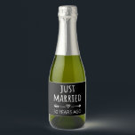 Just Married 50 Years Ago I Sparkling Wine Label<br><div class="desc">Cute design, perfect for anyone who's been married for 50 years and to a wedding vow renewal ceremony. It makes a great matching outfit for couples! 'Just Married 50 Years Ago' quote for a couple who got married 50 years ago or a couple renewing wedding vows on their golden anniversary....</div>