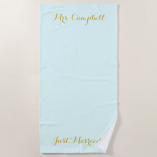 Just married in gold honeymoon towel