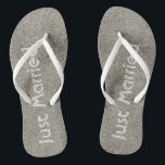 Just Married written in the Beach Sand Flip Flops<br><div class="desc">These fun just married flip flops feature the words "Just Married" written in the sand in white.  You can change the strap colour too!  Copyright Kathy Henis</div>