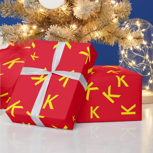 K custom letter - yellow name-initial on red wrapping paper (Holidays)