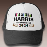 Kamala Coconut Trucker Hat<br><div class="desc">Stand up and speak out with this trucker hat supporting Kamala Harris campaign for President. Features colourful stylised stencil lettering and coconut graphic accents. Your choice of colour styles</div>
