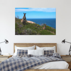 Kangaroo family with baby enjoying the ocean side canvas print