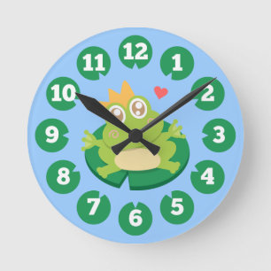 Kawaii frog with sparkling eyes on a lily pad round clock