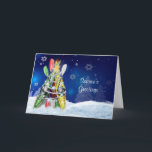 Kayak Christmas Tree Holiday Card<br><div class="desc">Kayaking greeting card with festive kayaks and paddles propped up,  decorated and wrapped in garland against a blue snowy star-filled nighttime sky for the Christmas season.  All rights reserved © katz_d_zynes</div>