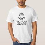 Keep Calm and Hug your Groom T-Shirt<br><div class="desc">Use the search tool at my store to find other Groom merchandise. Keep Calm and Hug your Groom products available on tshirts, sweatshirts, kids shirts, infant onsies, stickers, magnets, and much more Groom clothing fully customisable to your specifications. If you like what you see, please link to my store (www.zazzle.com/familytshirts)...</div>