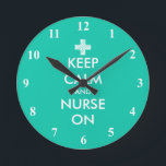 Keep Calm and nurse on custom wall clock<br><div class="desc">Keep Calm and nurse on custom wall clock. Mint green Keep Calm wall clock with numbers and medical cross icon. Create your own funny keep calm and carry on parody. Funny Birthday gift idea for RN nurse, registered nurse, caregiver, caretaker, student, assistant, doctor, friend, coworker, colleague, etc. Cute wall decor...</div>