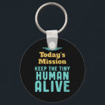 Keep The Tiny Human Alive Funny New Mum and Dad Key Ring<br><div class="desc">Today's Mission Keep Tiny Human Alive. Funny and sarcastic Mother's Day and Father's Day design for new parents of baby boy or girl. Cool and awesome merchandise for first time mum and dad trying to take care of their baby. Perfect design for young mother and father with military or army...</div>
