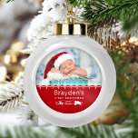 Keepsake Photo Babys First Christmas Red Ceramic Ball Christmas Ornament<br><div class="desc">Celebrate a special baby's first Christmas with this keepsake ornament,  featuring white snowflakes and text on a red background. Personalise it with baby's photo,  name,  and birth year.</div>