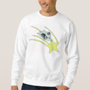 Kees riding on a star sweatshirt