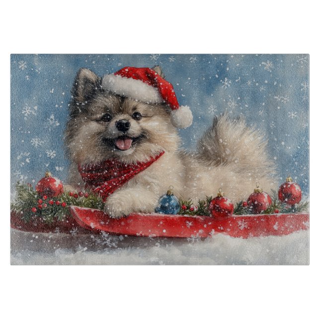 Keeshond Dog in Sledge Let it Snow Christmas Cutting Board (Front)
