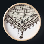 Keffiyeh Palestinian Scarf Traditional Fabric Clock<br><div class="desc">Palestinian / Arab Keffiyeh black and white Scarf designed as if wrapped around the neck, element isolated on white. The keffiyeh, also known as a hatta, is a traditional Arab headdress. Historically, it was worn by nomadic communities — or Bedouins — in historic Palestine. It's typically made of cotton and...</div>