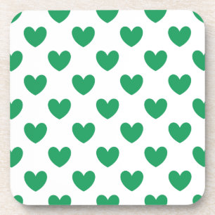 Kelly green polka hearts on white coaster
