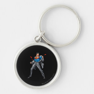 Kent changes into Superman Key Ring