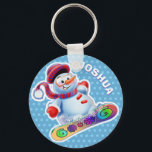 Key Ring Christmas Snowman characters.<br><div class="desc">Key Ring Christmas Snowman characters.
Key Ring Christmas Snowman characters. A variety of snowman characters sledging,  skiing and skating. Look out for the matching set with musician snow characters drumming and fiddling too. Available on other gifts and products.</div>