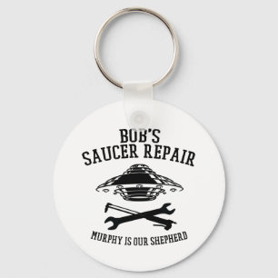 keychain with black Bob's Saucer Repair logo