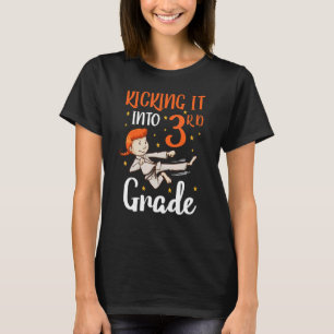 kicking it 3rd grade tae kwon do girl karate first T-Shirt