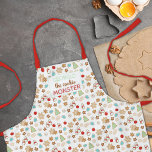 Kids Christmas Cookie Monster Patterned Holiday Apron<br><div class="desc">This cute "Cookie Monster" patterned holiday apron features festively decorated sugar Christmas cookies in the shapes of snowflakes, snowmen, Christmas trees, ornaments, and stars. Personalise with the name of your favourite cookie monster for a sweet, customised gift this year, (and a chance you'll entice them to bake even more cookies...</div>