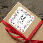 Kids Christmas Lights Monogram Square Sticker<br><div class="desc">This Christmas, inject a personal touch to your kids' presents with our distinctive monogram stickers. Featuring their initial, a heartfelt message, their own name, and the year, these stickers promise to not only label but also lovingly personalise each gift. So, think beyond the conventional, embrace the charm of personalisation and...</div>
