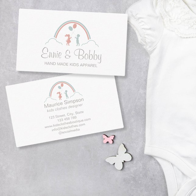 Kids Clothes Apparel Boutique Retail Baby Boutique Business Card (boy and a girl with balloons under the rainbow)